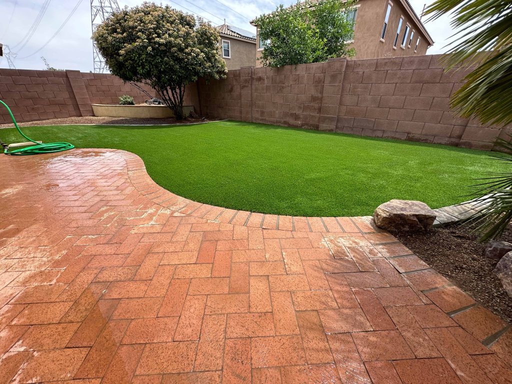 Artificial turf installation in Tucson AZ clean green low maintenance lawn alternative to natural grass
